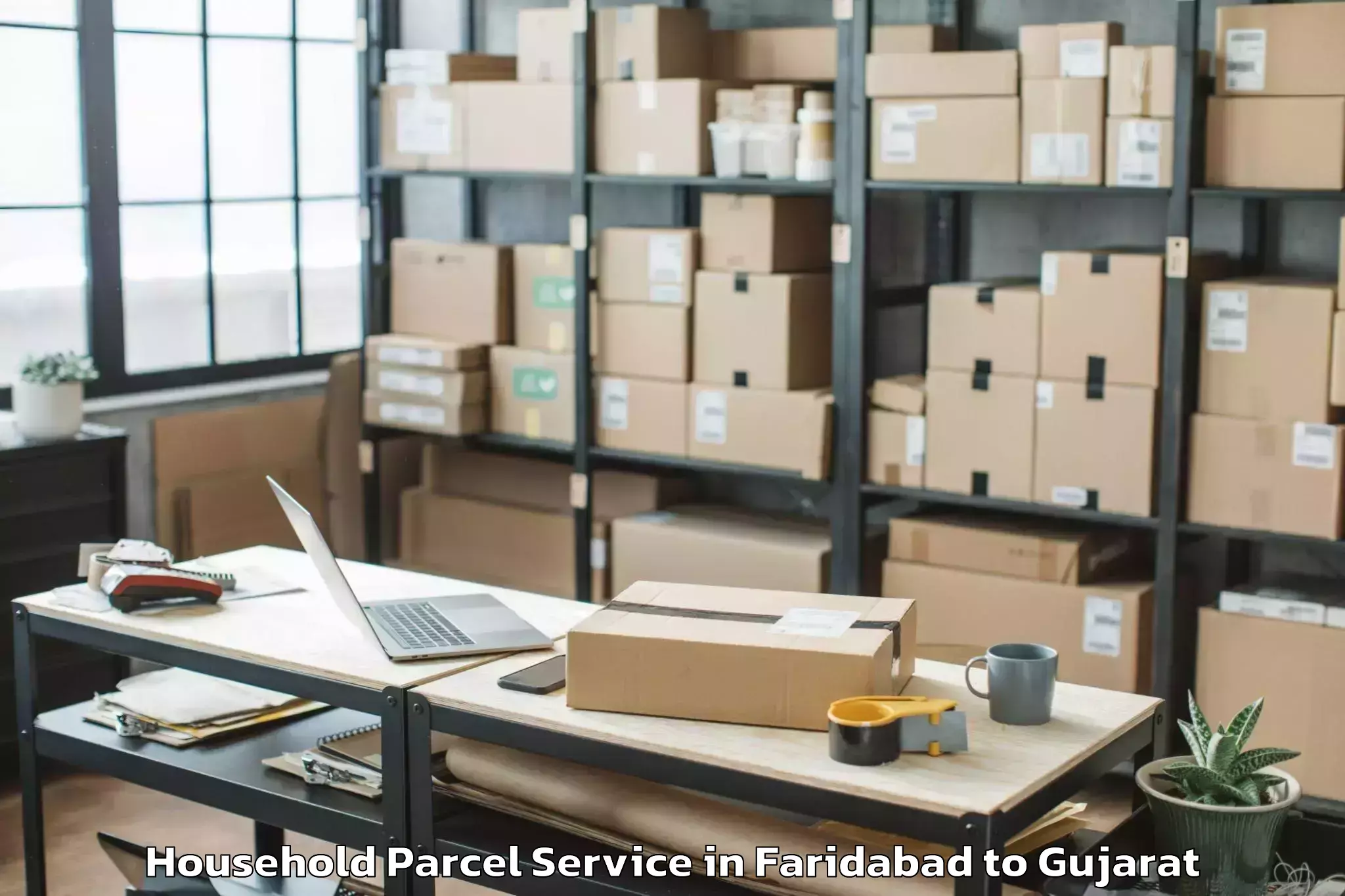 Quality Faridabad to Kadi Sarva Vishwavidyalaya Gan Household Parcel